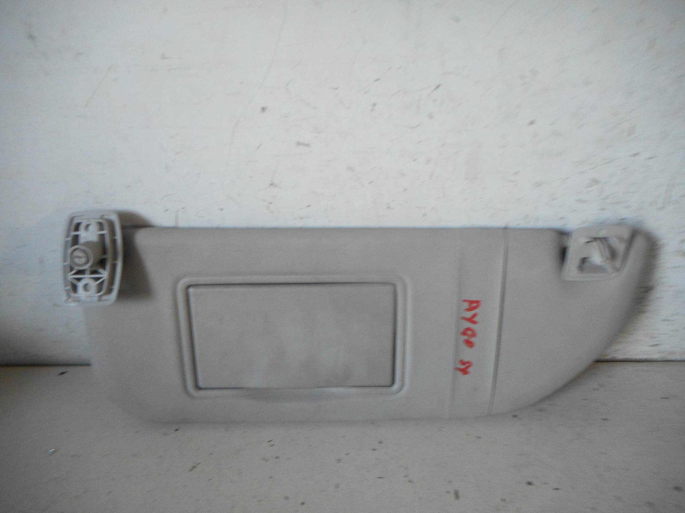 Aletta parasole parabrezza sx.